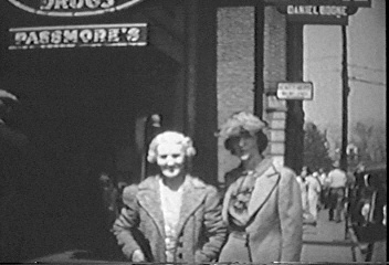 Ellen (Williams) 'Mom' Webb and her daughter, Estevah 'Steve' Webb, in front of Passmore's Pharmacy