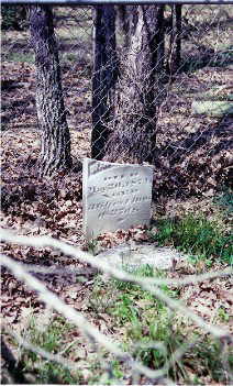 Broken stone of W. C. Wallace